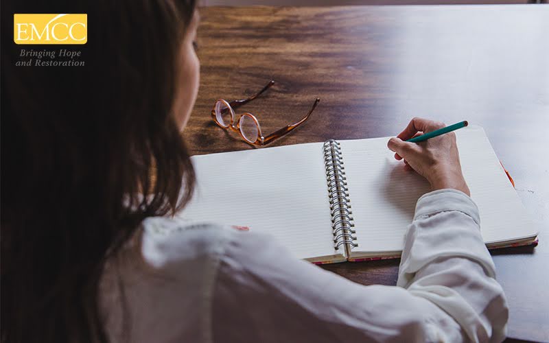 Person reflecting and planning for a new beginning after divorce.